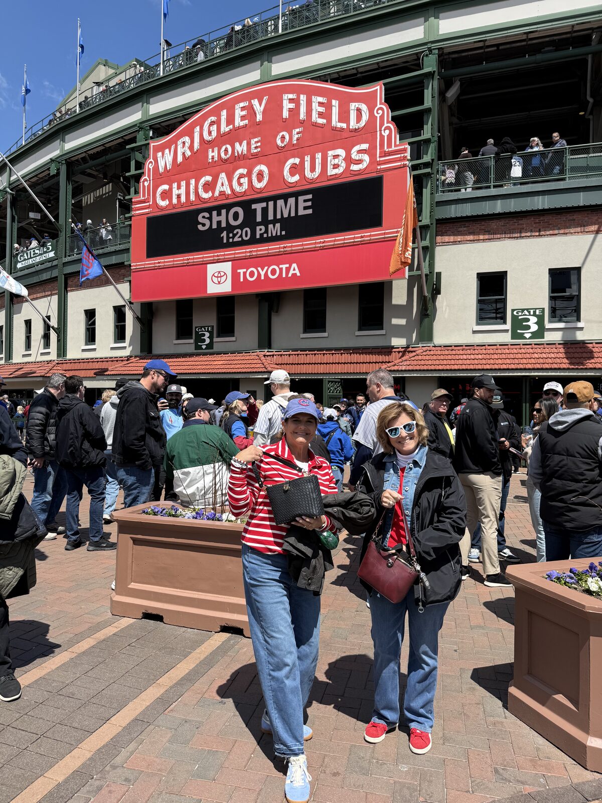Fans wearing Caitie G bags at Wrigley Field